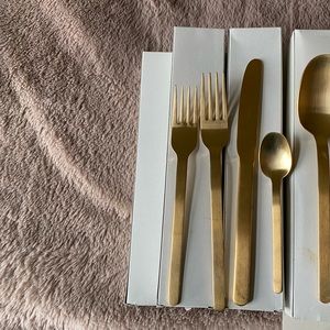 Gold 5 piece place setting.  Canvas style.  8 total sets